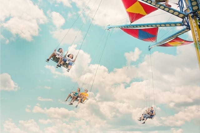 People on an amusement park ride